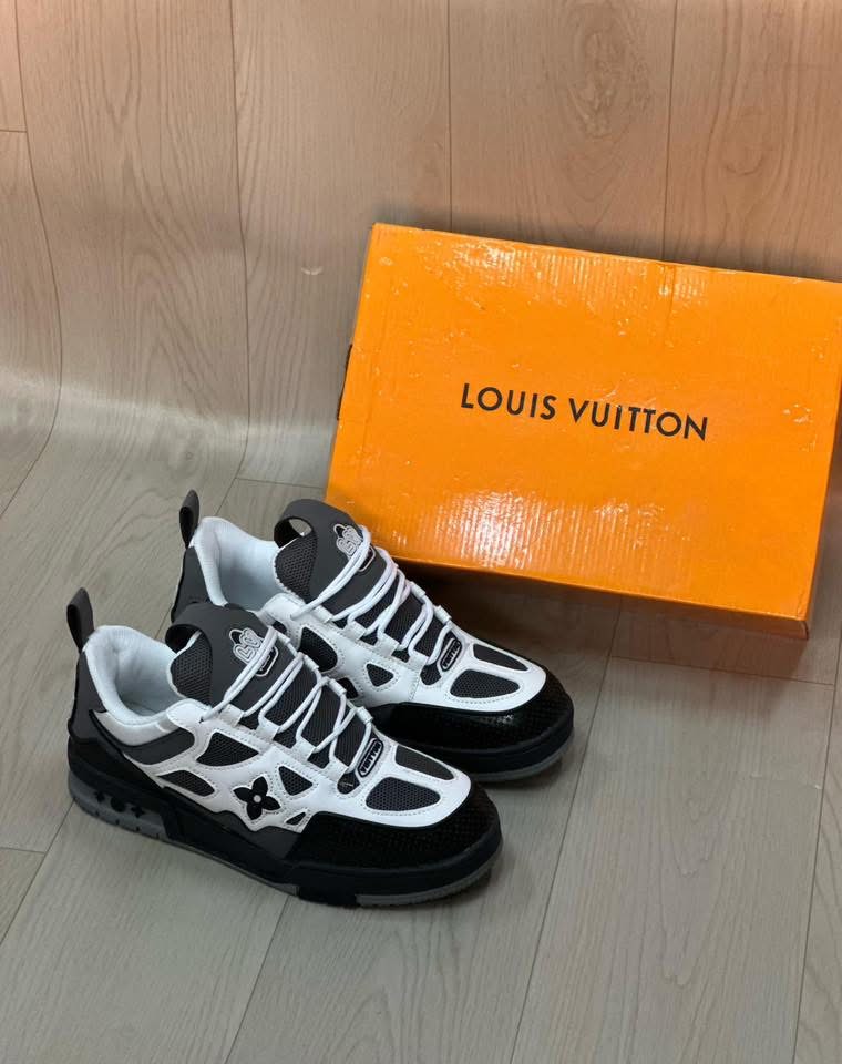 Baskets Louis Vuitton "LV Trainer" - Cuir et Mesh